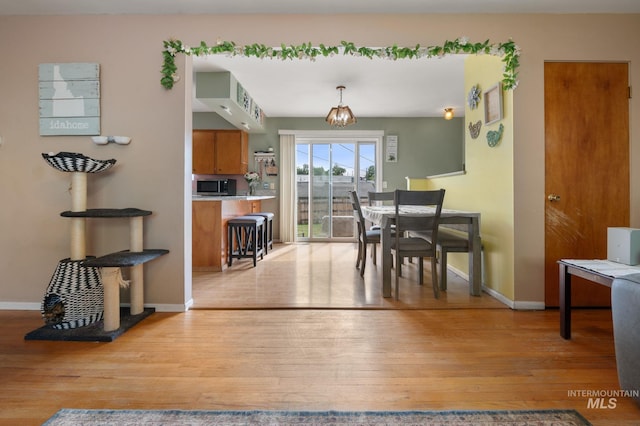 1713 12th St, Lewiston, ID 83501 - dining space featuring light wood-type flooring and baseboards