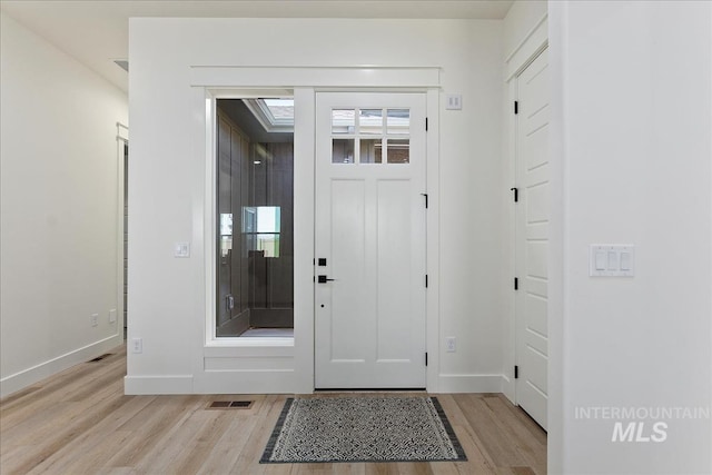 entryway with light wood-type flooring