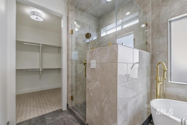 2215 Kooskia Loop, Twin Falls, ID 83301 - full bathroom with a shower stall, a walk in closet, and a freestanding bath