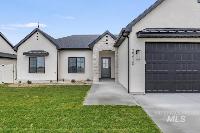 2215 Kooskia Loop, Twin Falls, ID 83301 - french country inspired facade with a standing seam roof, stucco siding, a metal roof, and a garage