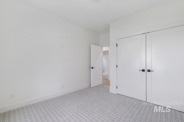 2215 Kooskia Loop, Twin Falls, ID 83301 - unfurnished bedroom with carpet floors and a closet