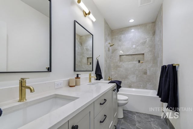 2215 Kooskia Loop, Twin Falls, ID 83301 - bathroom featuring double vanity, washtub / shower combination, and recessed lighting