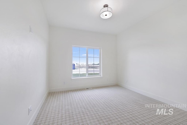 2215 Kooskia Loop, Twin Falls, ID 83301 - unfurnished room featuring carpet floors and baseboards