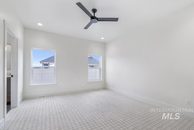 2215 Kooskia Loop, Twin Falls, ID 83301 - carpeted spare room featuring a ceiling fan and recessed lighting