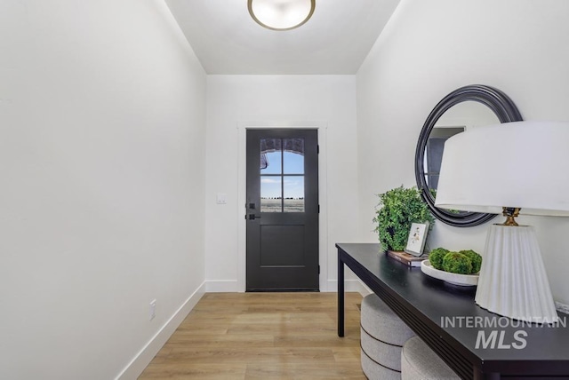 2215 Kooskia Loop, Twin Falls, ID 83301 - doorway featuring light wood finished floors and baseboards