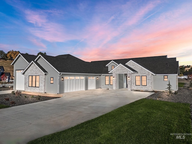 modern farmhouse style home featuring a garage