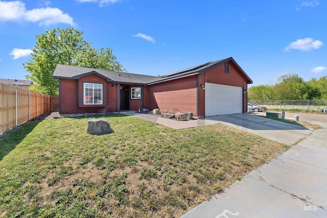 3004 Sandstone Pl, Caldwell, ID 83605 - single story home with concrete driveway, roof mounted solar panels, and an attached garage
