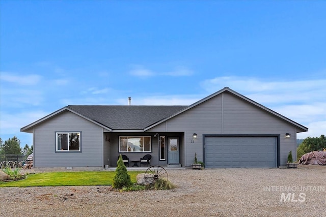 ranch-style house featuring a shingled roof, a porch, crawl space, a garage, and driveway