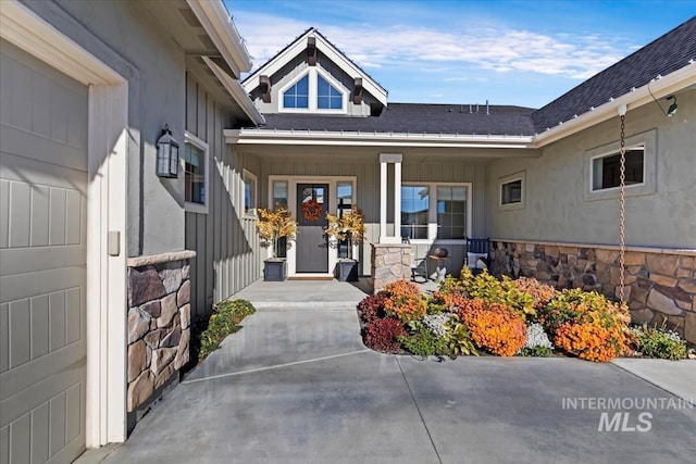 property entrance featuring a porch