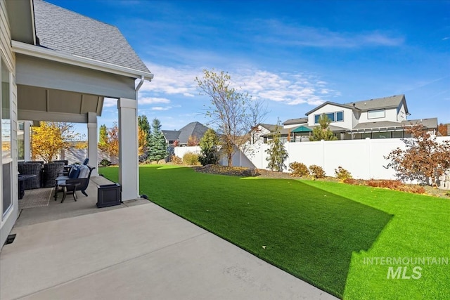 view of yard with a patio area