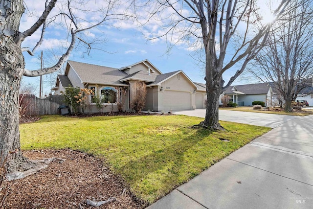 ranch-style home featuring a garage and a front yard