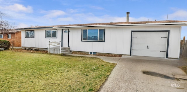 201 E 27th St, Burley, ID 83318 - single story home with a front lawn, an attached garage, and concrete driveway