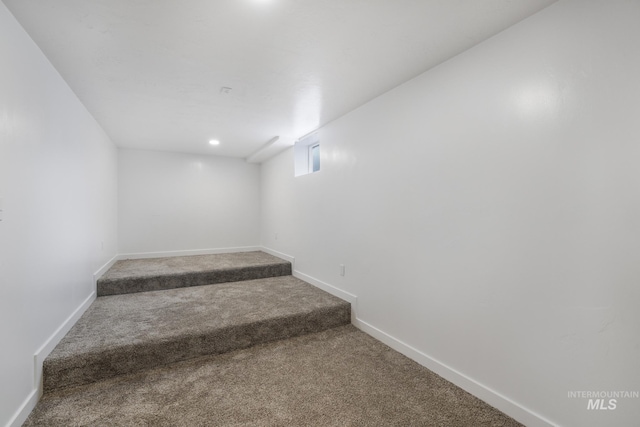 201 E 27th St, Burley, ID 83318 - staircase with baseboards and carpet floors