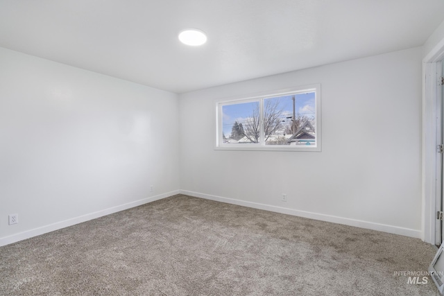 201 E 27th St, Burley, ID 83318 - carpeted spare room with baseboards