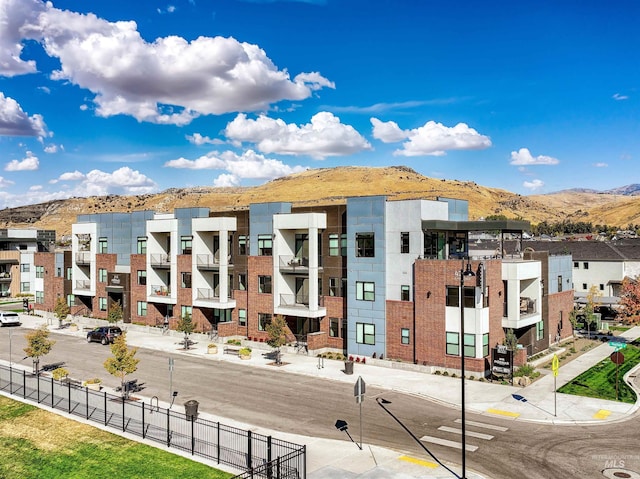 view of building exterior featuring a mountain view