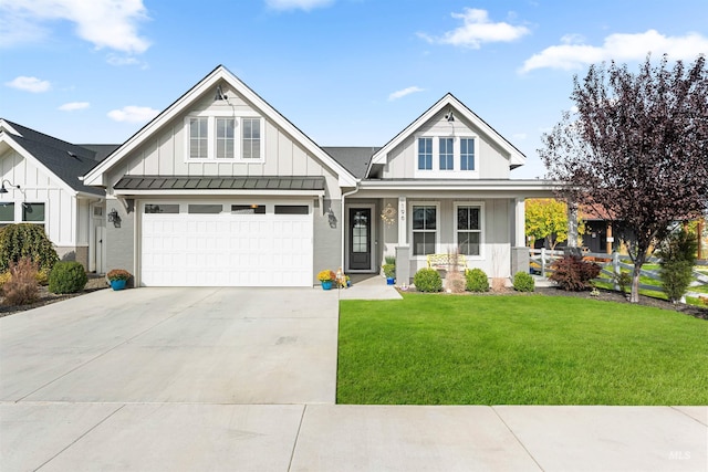 view of front of house featuring board and batten siding, a porch, a front yard, concrete driveway, and an attached garage