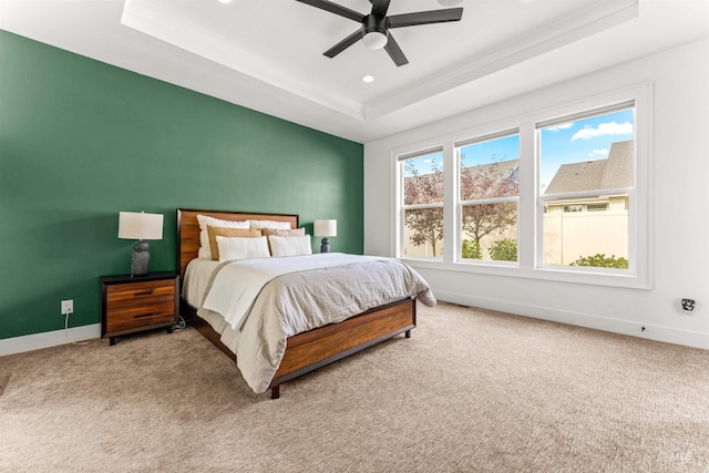 bedroom featuring ceiling fan, a raised ceiling, baseboards, carpet, and recessed lighting