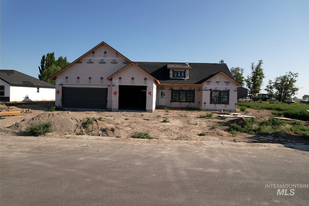 771 Biscotti Loop, Heyburn, ID 83336 - property in mid-construction featuring an attached garage and driveway