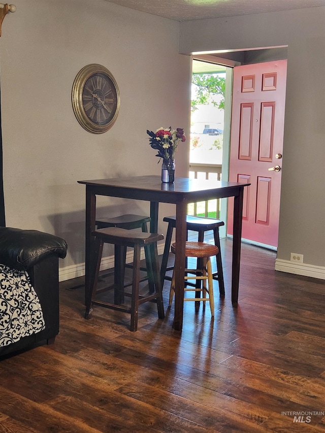 846 Wyoming St, Gooding, ID 83330 - dining space with baseboards and wood finished floors