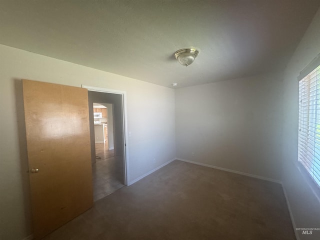 2451 W Park Stone Dr, Meridian, ID 83646 - carpeted empty room with baseboards