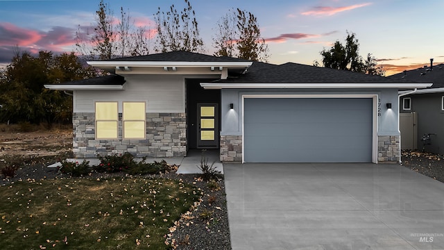 view of front of home with a garage