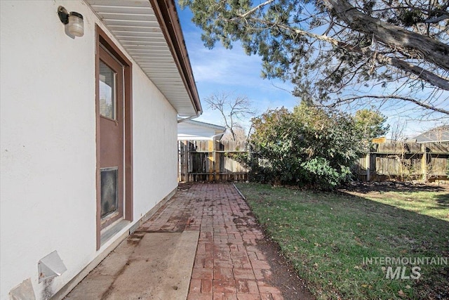 view of yard with a patio area