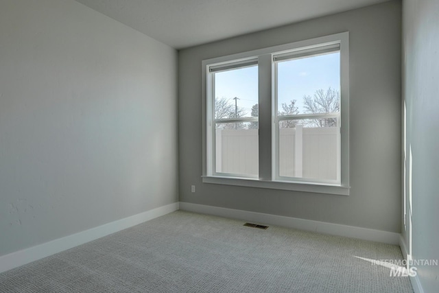 view of carpeted spare room