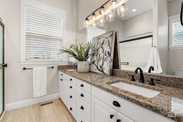 724 E Lakebrook Ln, Eagle, ID 83616 - bathroom featuring double vanity and toilet