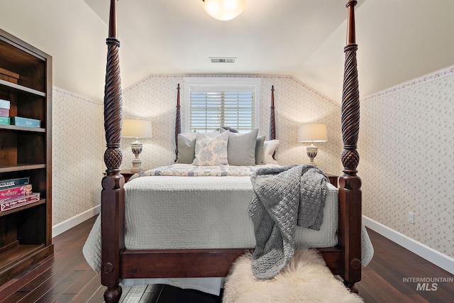 724 E Lakebrook Ln, Eagle, ID 83616 - bedroom with wallpapered walls, wood-type flooring, and vaulted ceiling