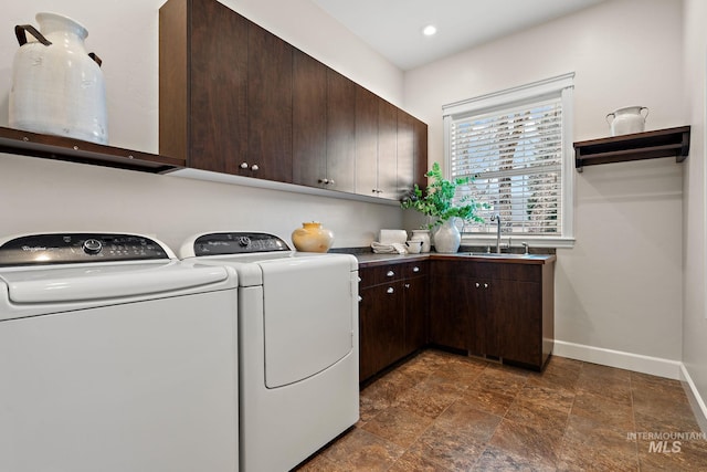 724 E Lakebrook Ln, Eagle, ID 83616 - laundry room with cabinet space, washer and clothes dryer, stone finish flooring, and recessed lighting