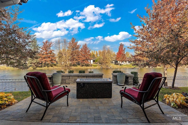 724 E Lakebrook Ln, Eagle, ID 83616 - view of patio / terrace featuring a water view