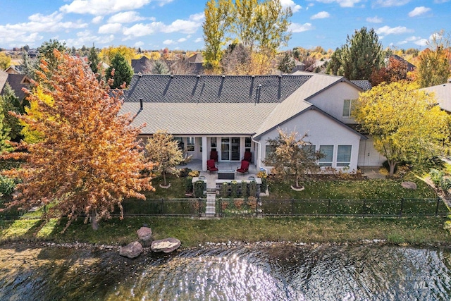724 E Lakebrook Ln, Eagle, ID 83616 - view of front facade featuring a patio and a fenced backyard