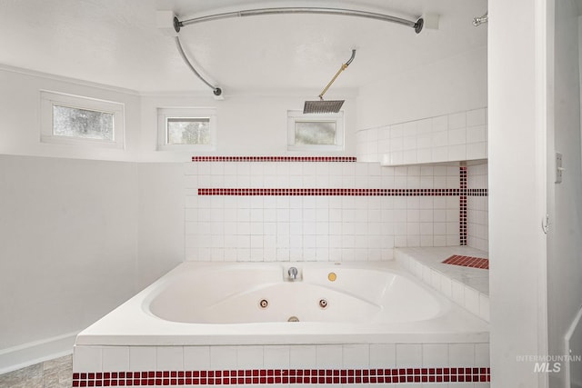 bathroom featuring a jetted tub