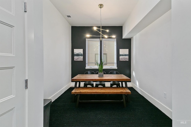 dining area with a chandelier