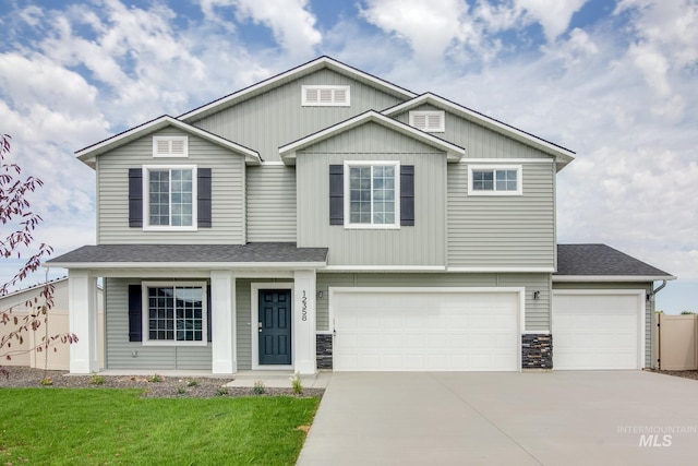 view of front of property featuring a garage