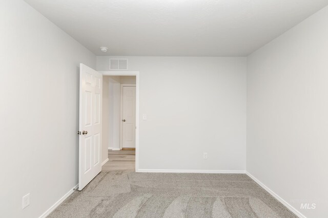 672 S Jayo Ct, Emmett, ID 83617 - unfurnished room featuring a textured ceiling, light hardwood / wood-style flooring, and ceiling fan