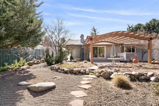 back of property with a patio, fence, and a pergola