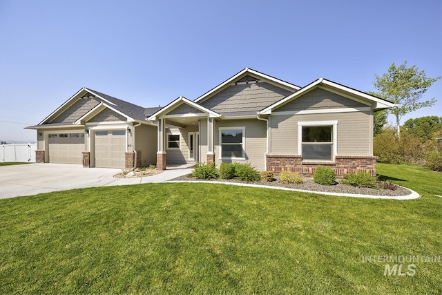 craftsman house with driveway, a front yard, fence, brick siding, and a garage