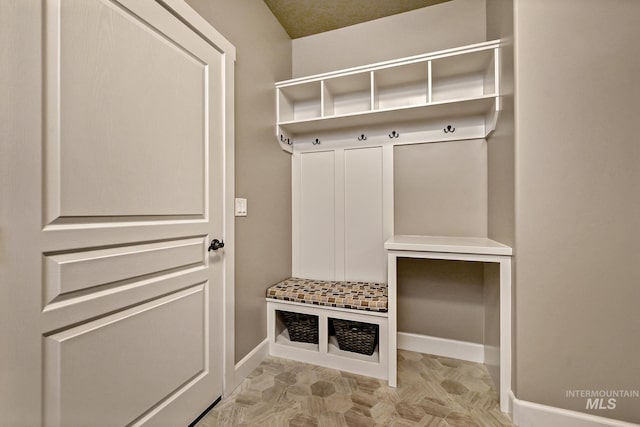 mudroom featuring baseboards