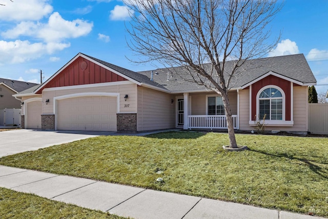 ranch-style house featuring a garage, brick siding, concrete driveway, and a front yard