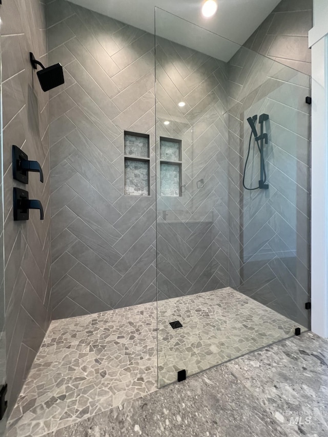 bathroom featuring walk in shower