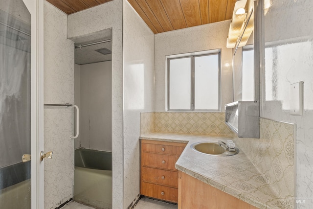 bathroom with vanity, wooden ceiling, and backsplash