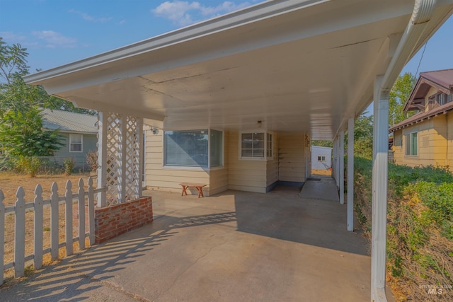 view of patio / terrace with a carport