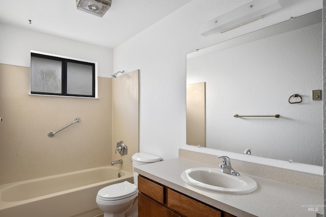 bathroom featuring visible vents, tub / shower combination, toilet, and vanity