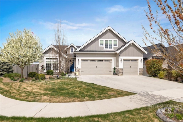 craftsman house featuring concrete driveway, stone siding, an attached garage, fence, and a front yard