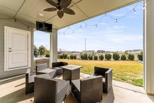 view of patio / terrace with ceiling fan and outdoor lounge area