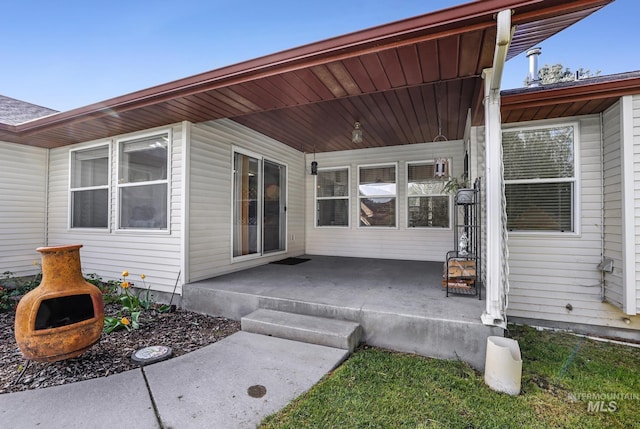 doorway to property featuring a porch