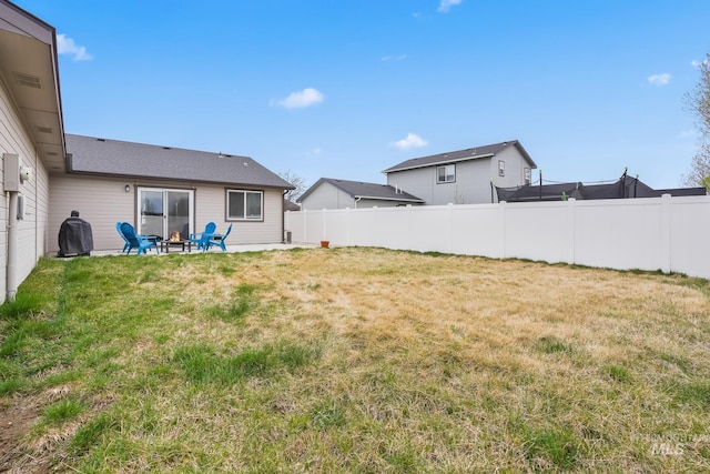 319 Magnolia Ave, Fruitland, ID 83619 - view of yard featuring a patio area