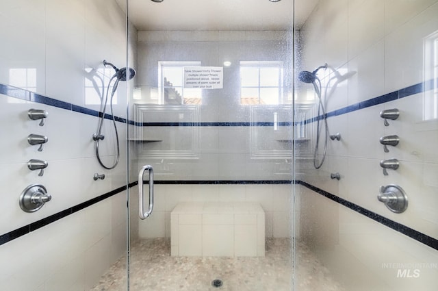 bathroom featuring a stall shower