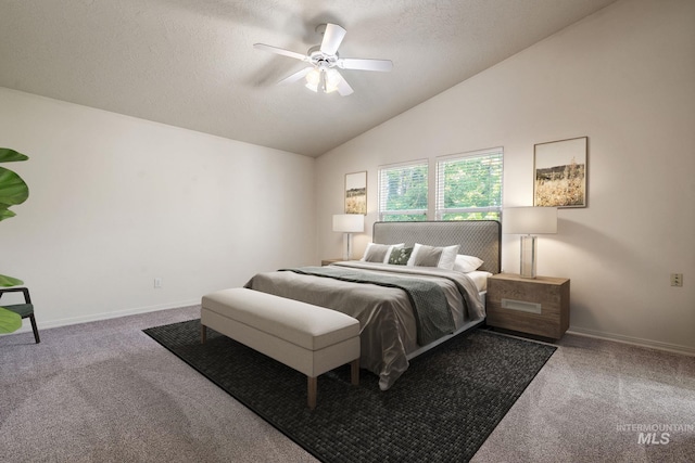 bedroom with carpet flooring, vaulted ceiling, baseboards, ceiling fan, and a textured ceiling